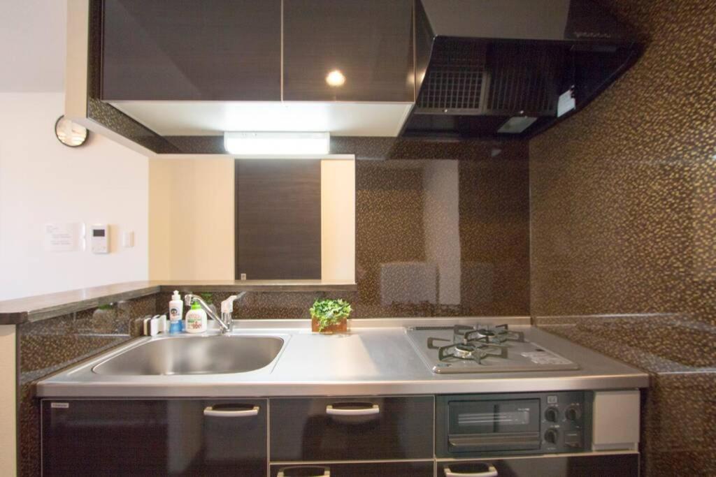 Ferienwohnung ようこそ札幌へ! 大通公園まで地下鉄10分 定員6名 Firetv完備 1階はセコマ Exterior foto