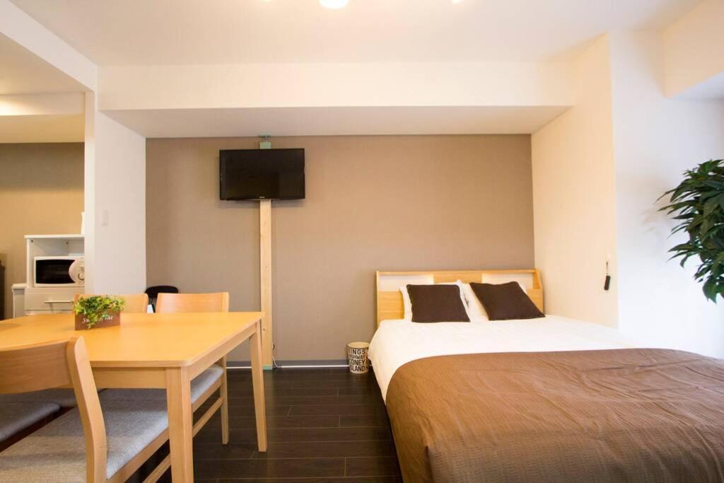 Ferienwohnung ようこそ札幌へ! 大通公園まで地下鉄10分 定員6名 Firetv完備 1階はセコマ Exterior foto