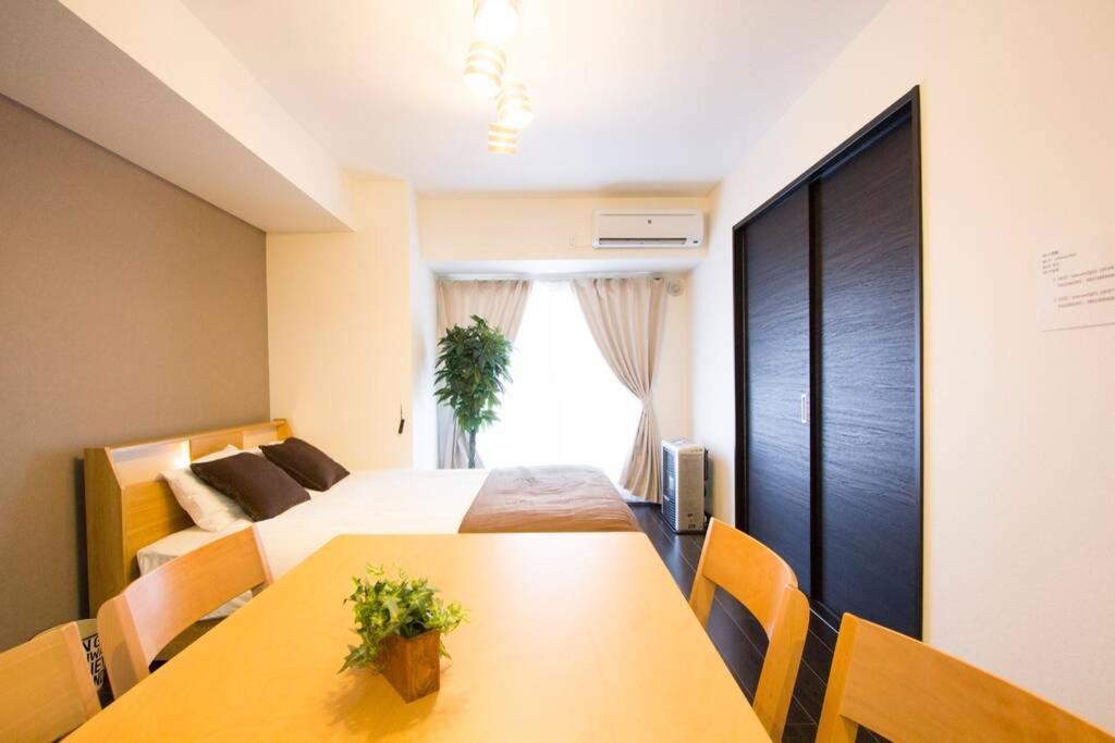 Ferienwohnung ようこそ札幌へ! 大通公園まで地下鉄10分 定員6名 Firetv完備 1階はセコマ Exterior foto